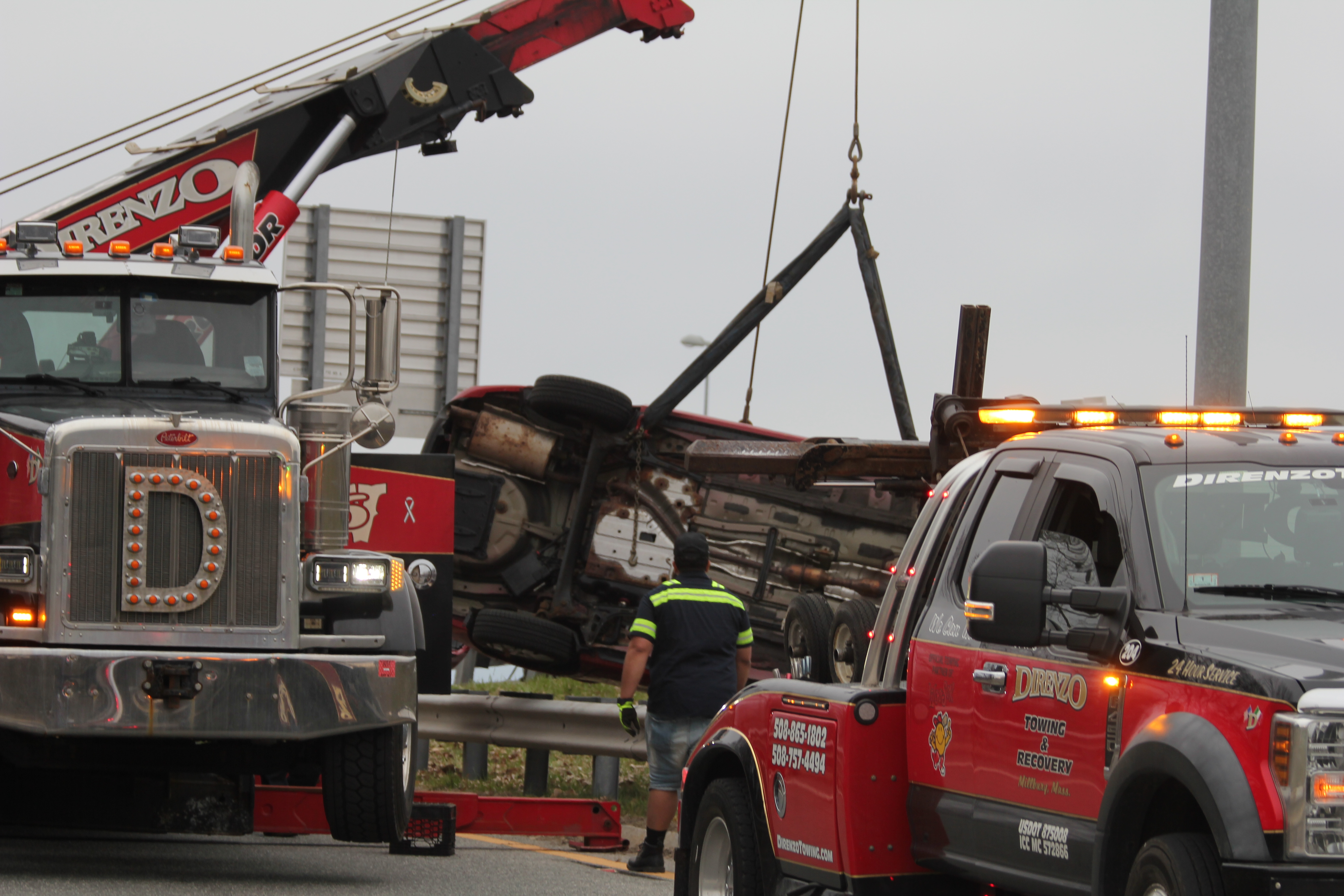 Vehicle Rollover on I-290 in Worcester Leaves Car Trapped Between Guardrails, Driver Okay
